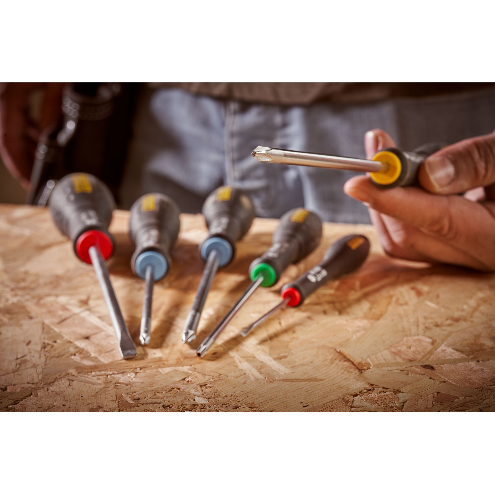 STANLEY 0-65-209 screwdriver set with color-coded handles on wood surface, close-up photography.