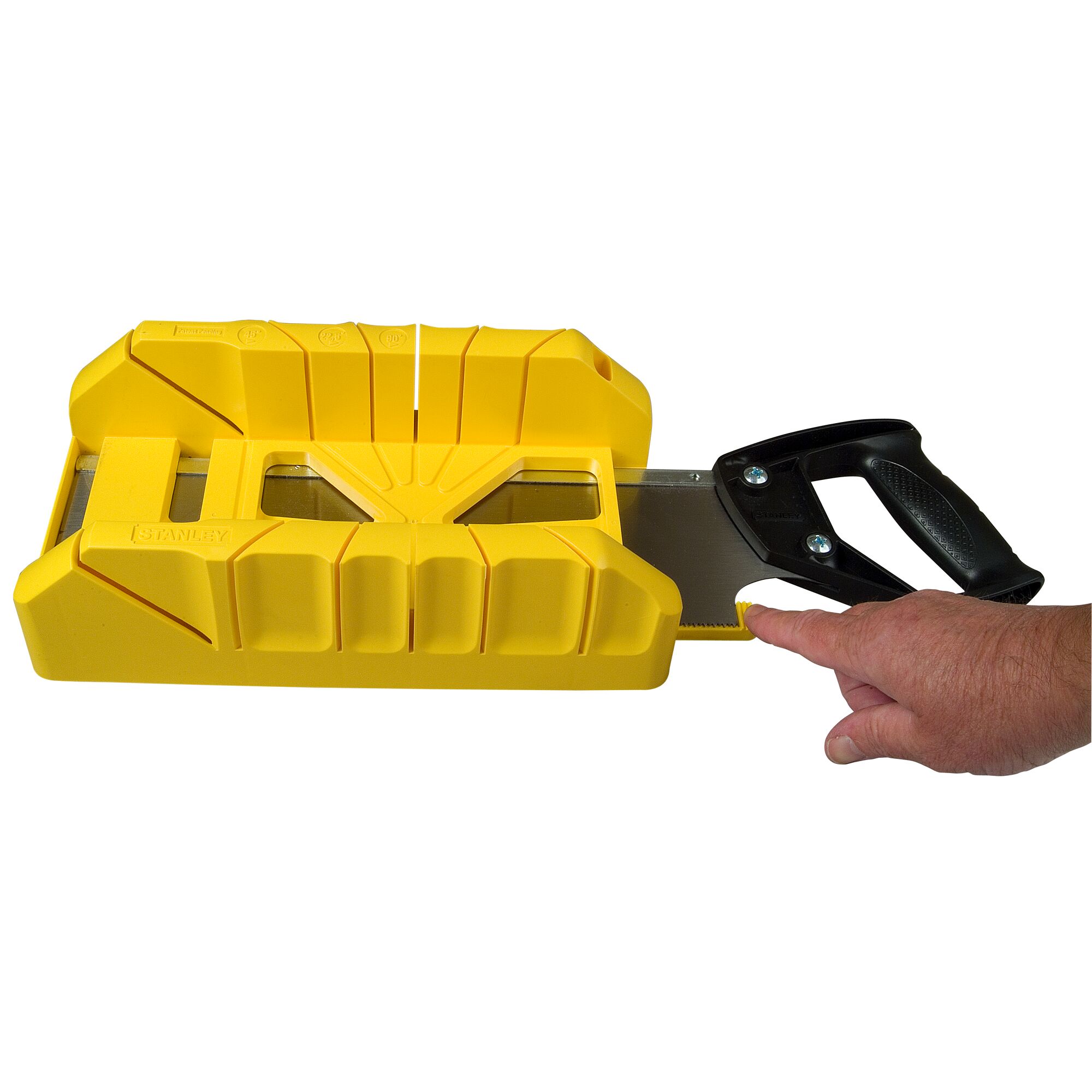 STANLEY 1-19-800 mitre box and saw set, yellow plastic, angled view, hand holding handle.