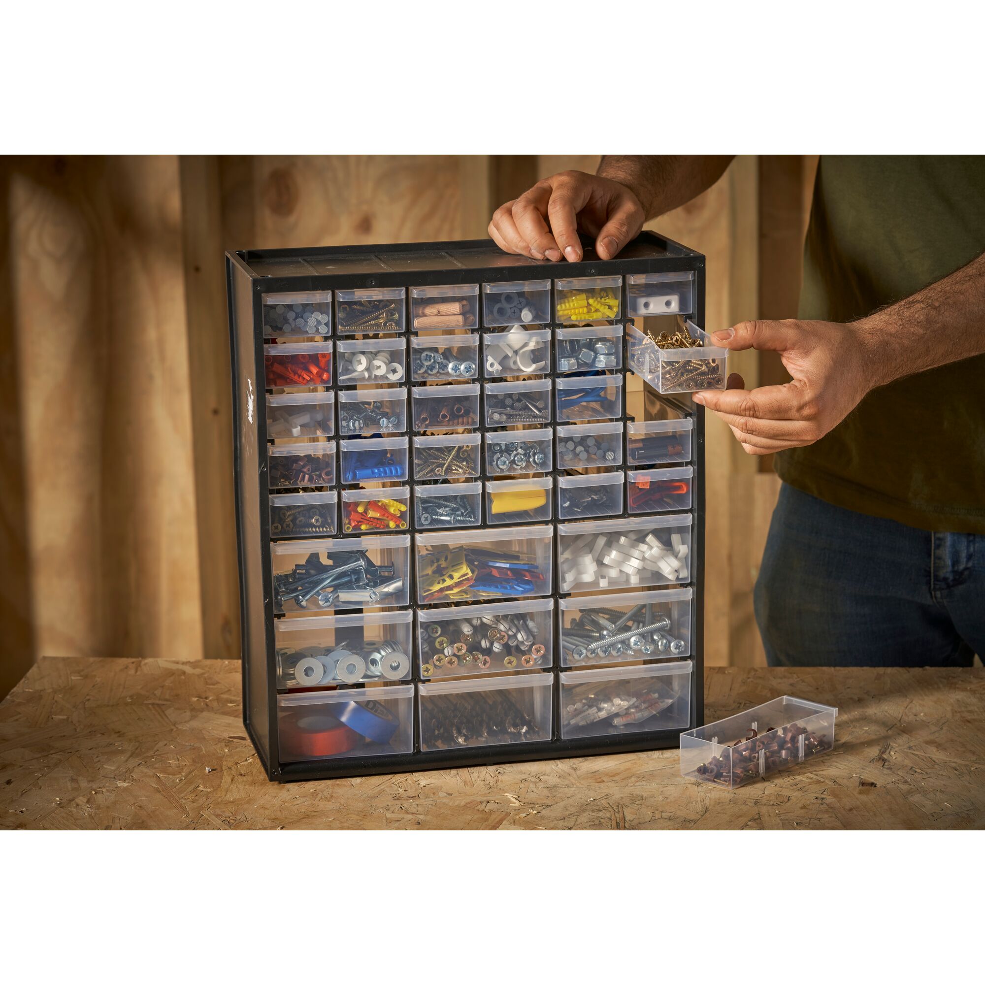 STANLEY 1-93-981 organizer cabinet with multiple drawers, filled with assorted hardware, frontal angle.