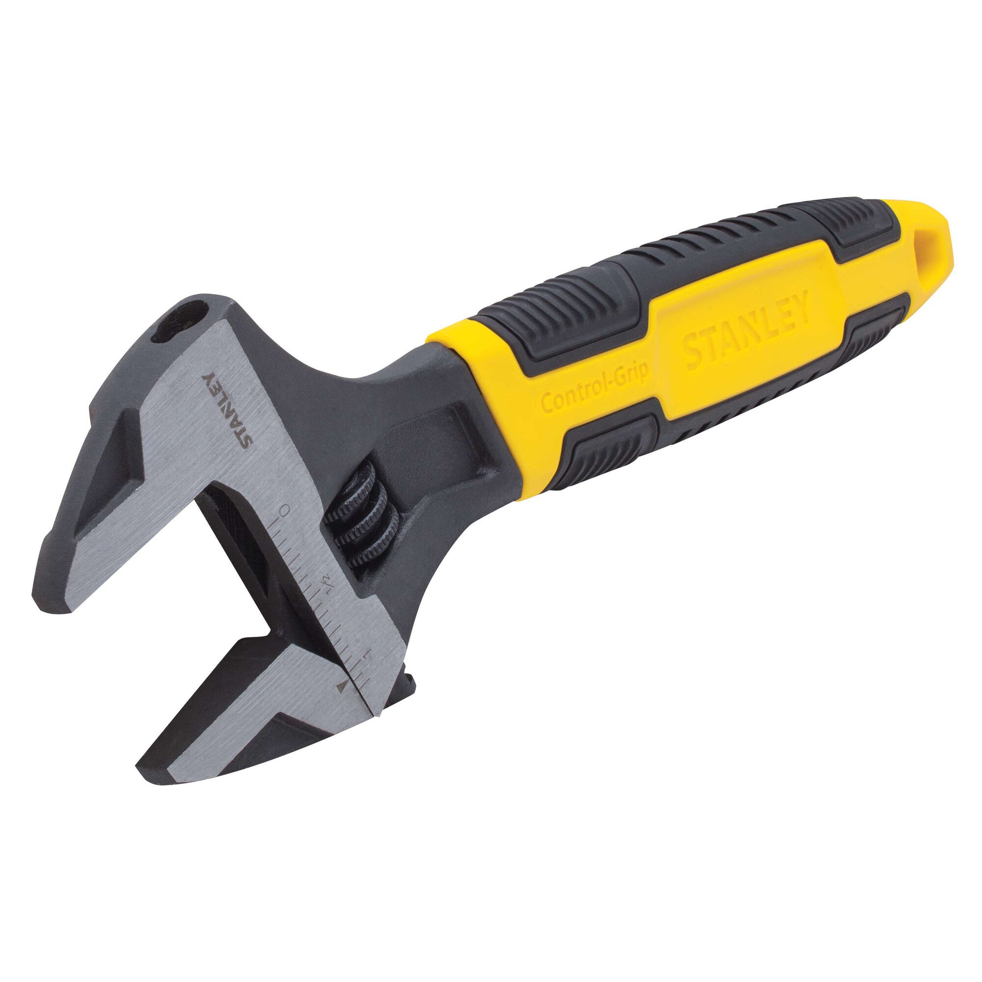 Stanley adjustable wrench with black and yellow Control-Grip handle, angled side view on white background.