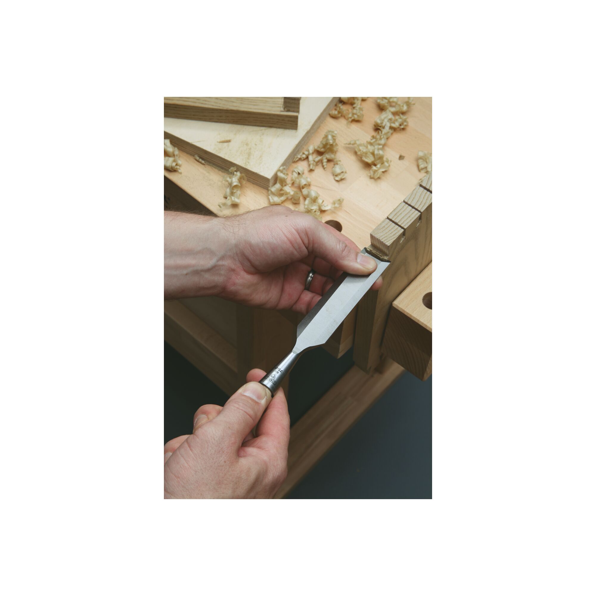 8 piece sweetheart 750 series socket chisel set being used to chisel a piece of wood.