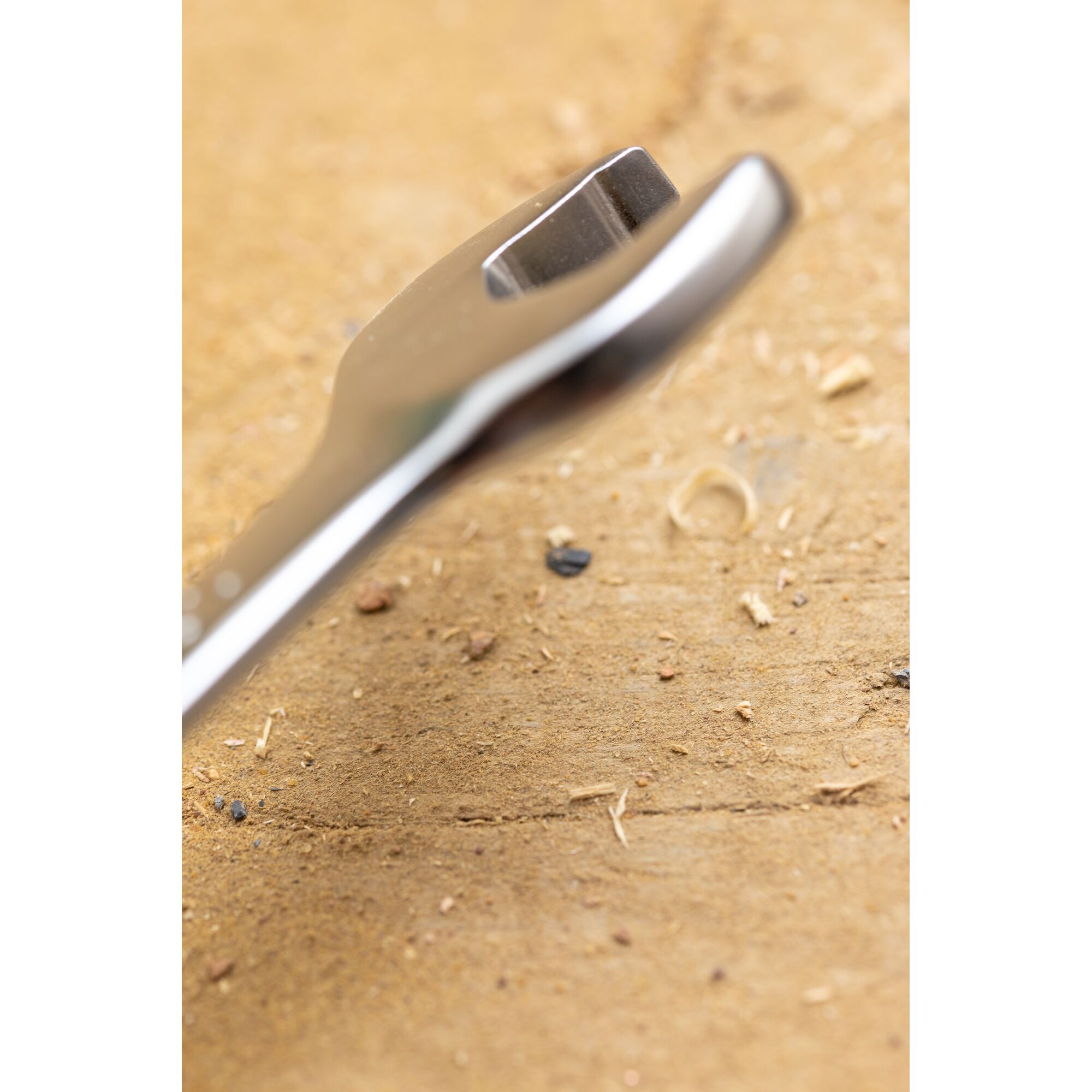 STANLEY FMMT13095-0 wrench close-up on wooden surface, showing the angled open end.