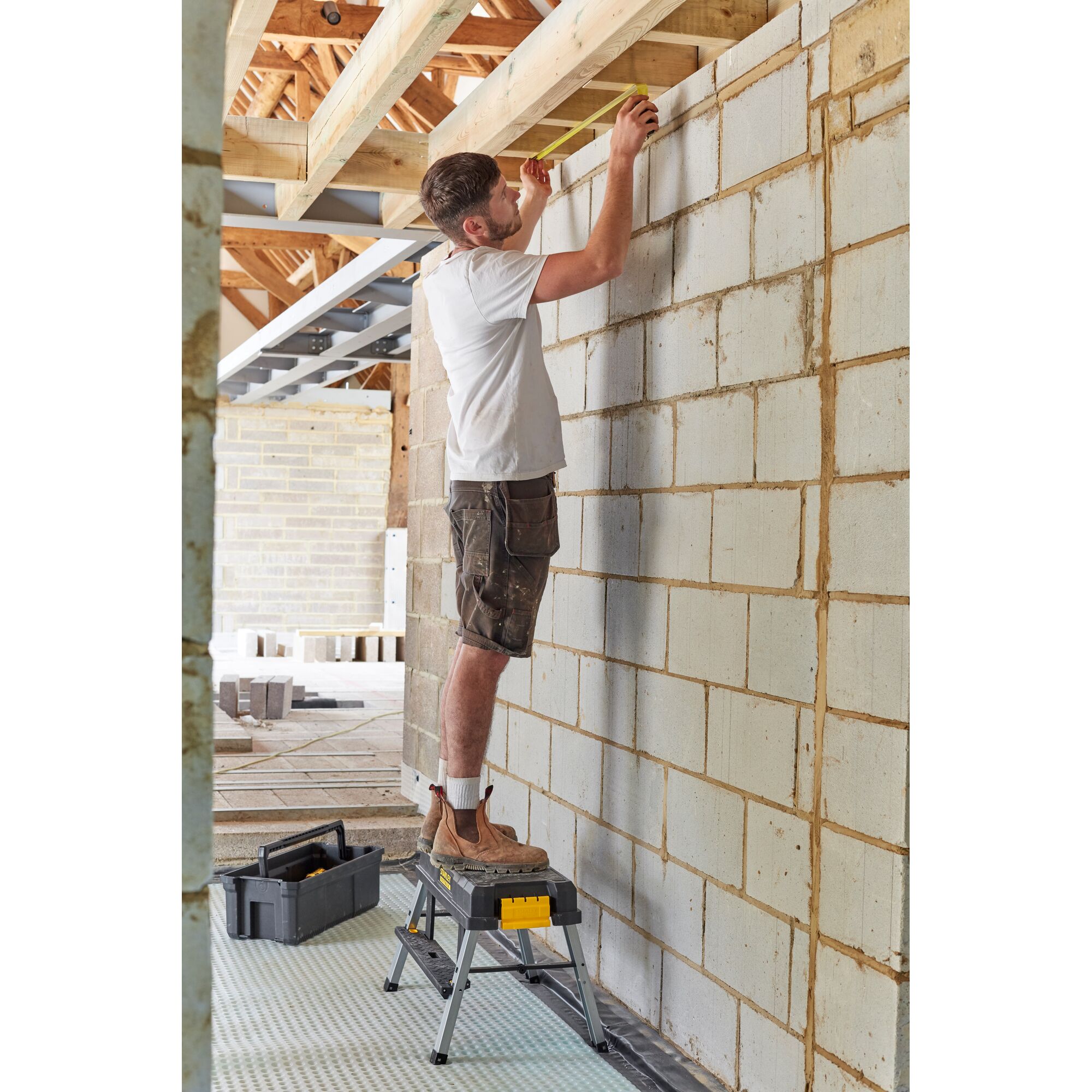 Photo of STANLEY FMST81083-1 work platform in use on a construction site.